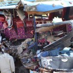At least 13 people died after a truck collided with a bus.