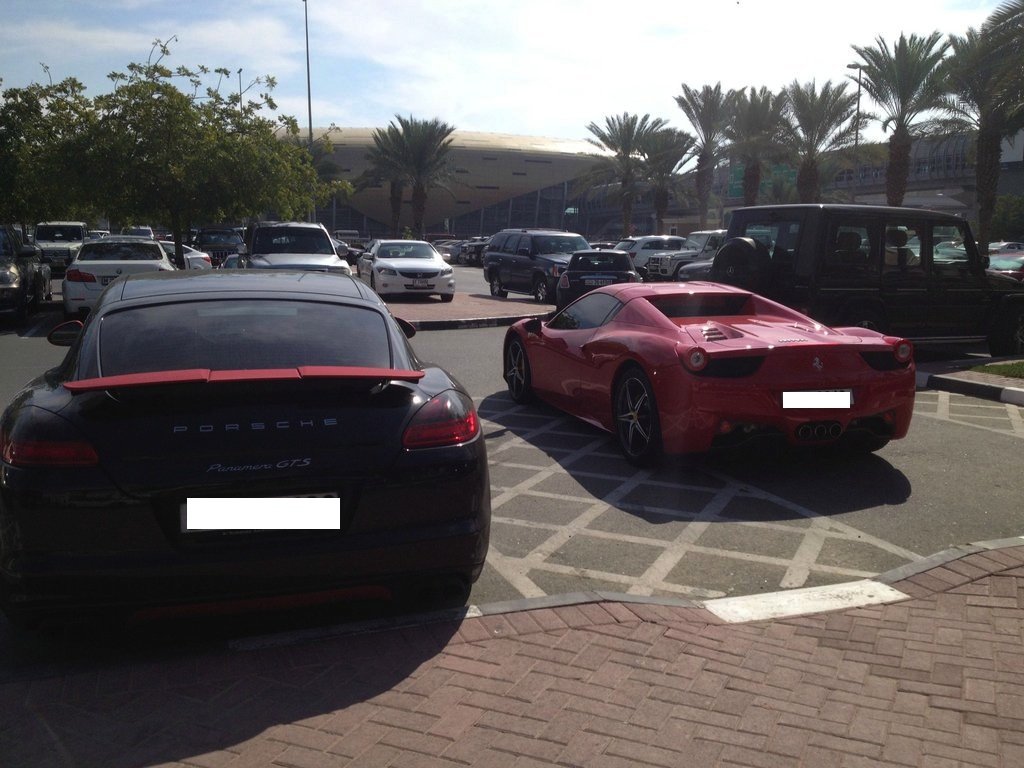 Porsche and a Ferrari, side by side